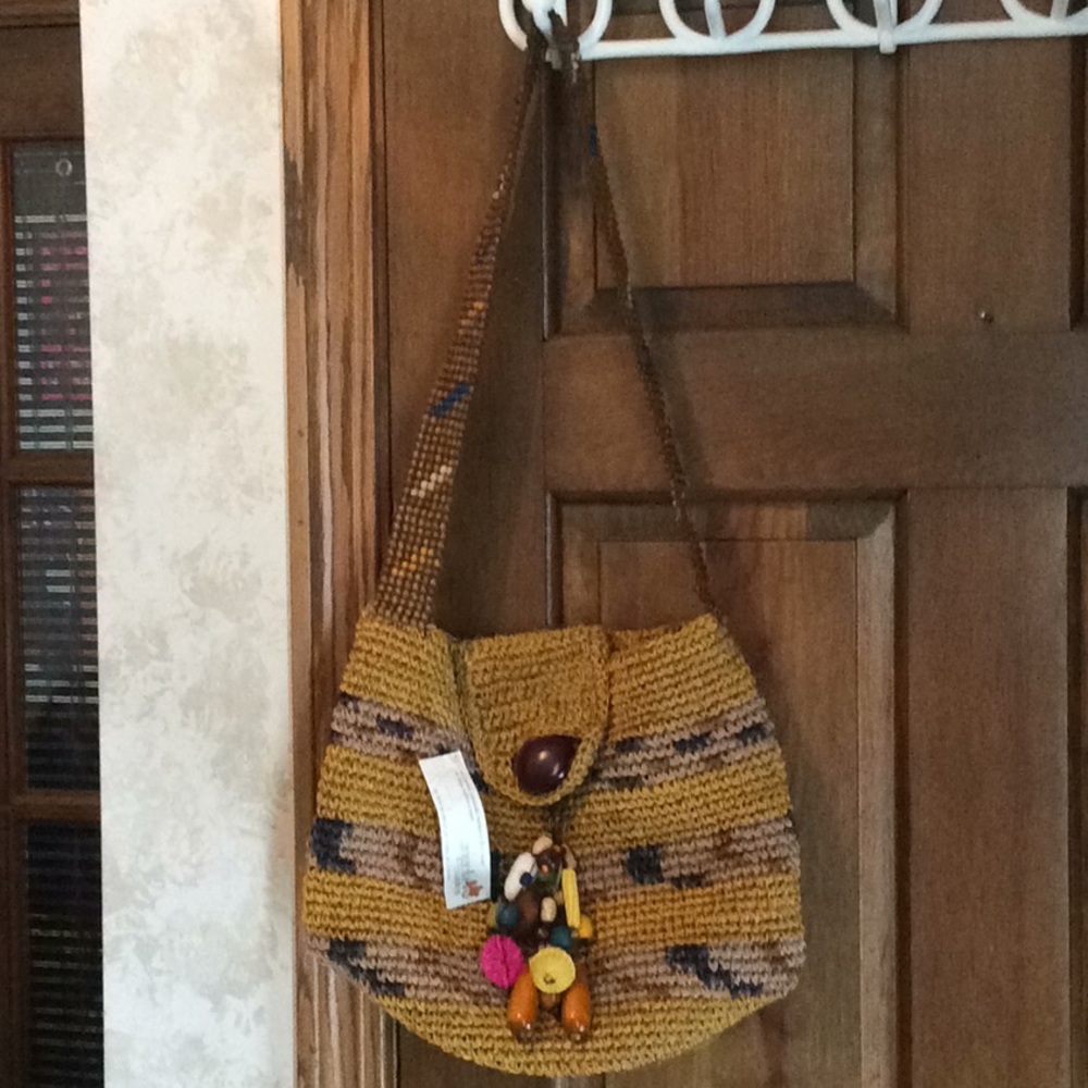 Handmade, multicolored/woven shoulder bag w/charm!